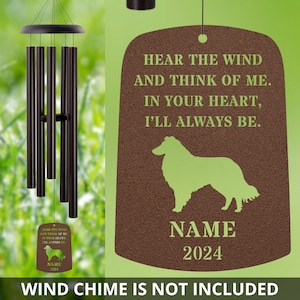 May include: A brown metal memorial plaque with a green silhouette of a Collie dog. The plaque reads "Hear the wind and think of me. In your heart, I'll always be."  The plaque also includes the text "NAME 2024".