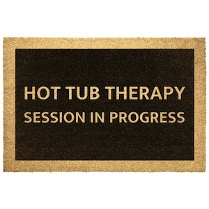 May include: A brown doormat with a black background and the text "HOT TUB THERAPY SESSION IN PROGRESS" in gold lettering.