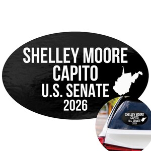 May include: An oval black car decal featuring white text that reads SHELLEY MOORE CAPITO U.S. SENATE 2026, accompanied by a white silhouette map of West Virginia. The decal is shown applied to the rear window of a white vehicle in a small inset.
