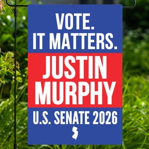 May include: A rectangular garden flag featuring a blue top and bottom section with white text reading VOTE. IT MATTERS. and U.S. SENATE 2026. The center red section displays the white text JUSTIN MURPHY. A small white silhouette of New Jersey is at the bottom.