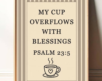 May include: Framed wall art with a beige background and vertical striped border. The artwork features the text "MY CUP OVERFLOWS WITH BLESSINGS PSALM 23:5" and a coffee cup illustration with a heart.