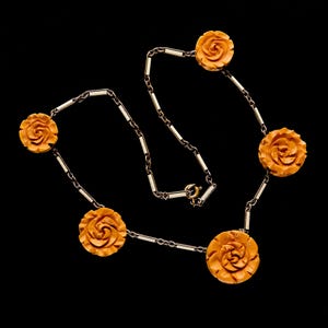 Vintage Bakelite necklace from the 30s of the twentieth century with deep carving BAKELIT ROSE. Tested with semi-chrome polishing. Gift
