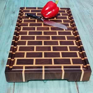 Black Walnut and Hard Maple brick and mortar style end grain cutting board