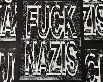 Parche punk para coser con la frase "FCK RACISMO", 11 x 14