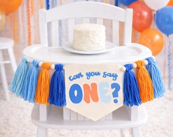 Ms. Rachel First Birthday High Chair Banner: Blue & Orange Yarn Tassels