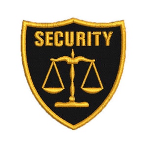 Puede incluir: Parche bordado negro y dorado en forma de escudo. El parche dice "SECURITY" en letras doradas y presenta una balanza de justicia dorada.
