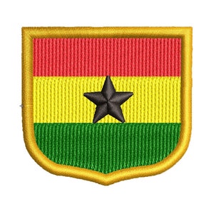 May include: A gold-bordered patch with the flag of Ghana. The flag features three horizontal stripes: red, yellow, and green. A black five-pointed star is centered on the yellow stripe.