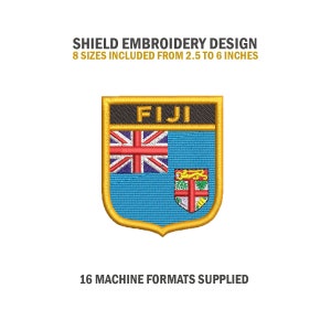 May include: A gold shield embroidery design with the Fijian flag and the word "FIJI" in black text. The design is available in 8 sizes from 2.5 to 6 inches and 16 machine formats.