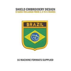 May include: A gold shield-shaped embroidery design with the word "BRAZIL" in black text and the Brazilian flag inside. The design is available in 8 sizes from 2.5 to 6 inches.