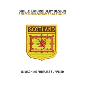 May include: A gold shield-shaped embroidery design with the word "SCOTLAND" at the top and a red lion rampant on a yellow background inside. The design is available in 8 sizes from 2.5 to 6 inches.