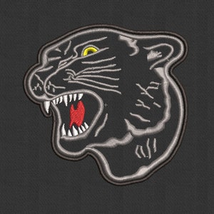 May include: Black and white embroidered patch of a snarling panther head with a yellow eye.