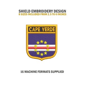 May include: Embroidered patch design of the Cape Verde flag in a shield shape. The flag features a blue background with a white stripe and a red stripe, and a circle of ten yellow stars. The text "CAPE VERDE" is written in a gold banner at the top of the shield.