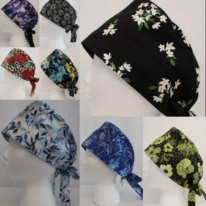 May include: Assortment of colorful patterned surgical scrub caps with ties. The caps feature various floral, geometric, and abstract designs.