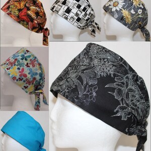 May include: Assortment of colorful patterned surgical scrub caps with tie backs. The caps feature various designs including butterflies, flowers, geometric shapes, and a solid blue color.