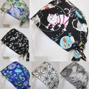 May include: Assortment of colorful surgical caps with various patterns, including floral, animal, and abstract designs. The caps are made of soft, breathable fabric and feature a tie-back closure for a secure fit.