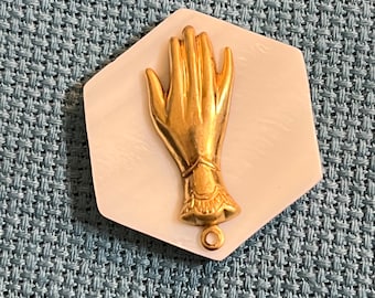 Vintage magic hand and mother of pearl  needle minder