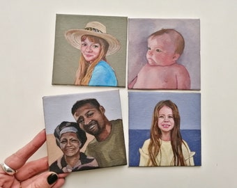 May include: Four small square canvas paintings. One depicts a person wearing a straw hat, another a baby, and the other two portraits of people. The paintings are displayed against a white background.