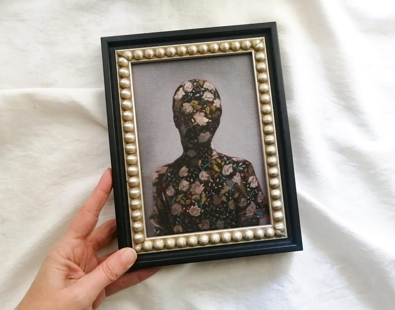 Faceless female portrait painting In Wooden frame