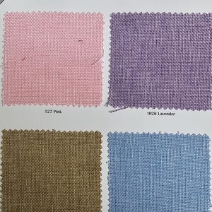 May include: A fabric sample card featuring four swatches of Vintage Linen. The colors include pink, lavender, oatmeal, and blue. The fabric is 100% polyester and 58-60 inches wide. The pink swatch is labeled "527 Pink", the lavender "1026 Lavender".
