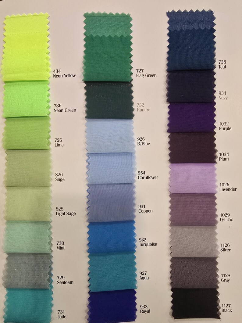 May include: A color chart with fabric swatches in various shades of green, blue, purple, and gray. Each swatch is labeled with a number and a color name.