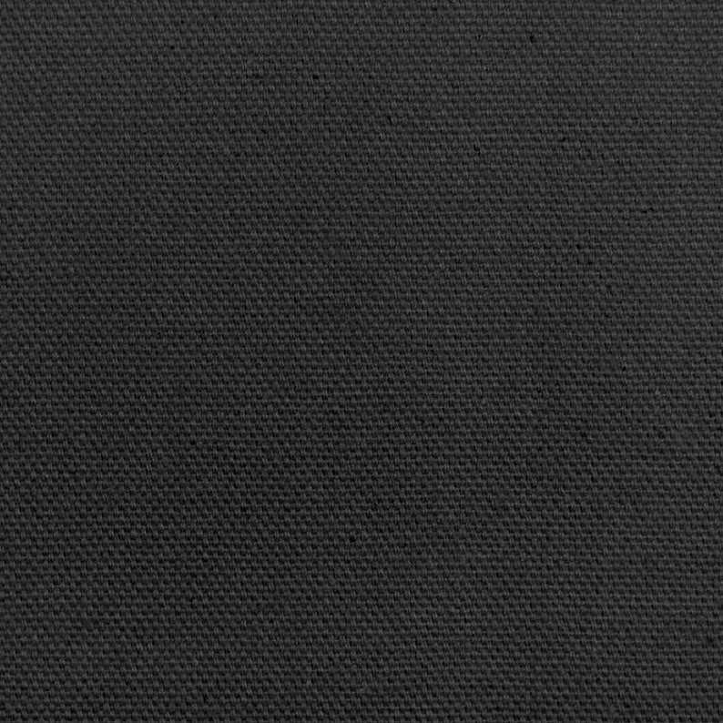 K&ouml;nnte beinhalten: Nahaufnahme eines dunkelgrauen Stoffes mit einer dezenten gewebten Textur.