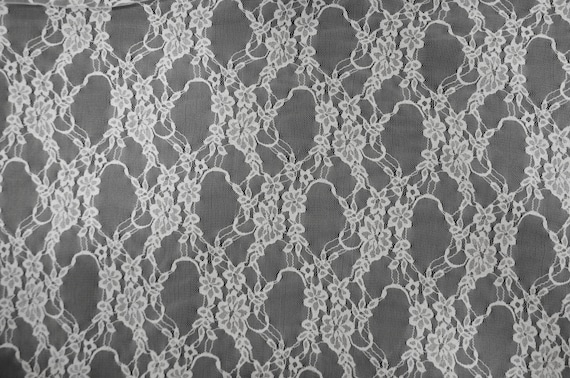 Ivory Stretch Lace Bolt Fabric (95% Nylon 5% Lycra)