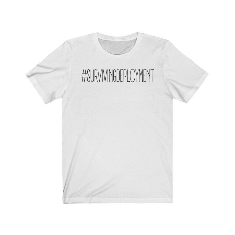 May include: White t-shirt with black text that reads "#SURVIVINGDEPLOYMENT"