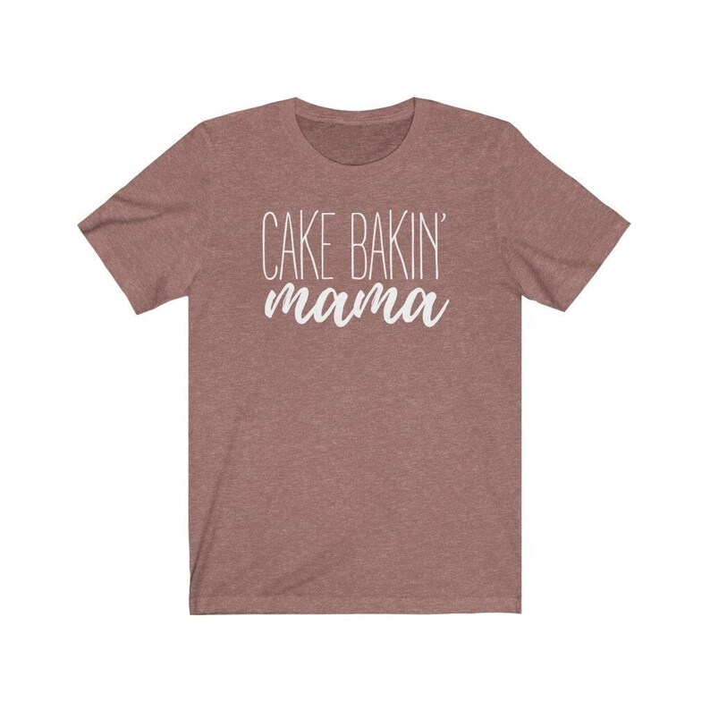 May include: A heather gray short-sleeved t-shirt with the text "CAKE BAKIN' mama" in white.