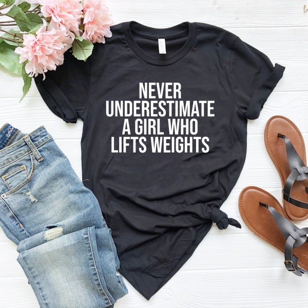 Never underestimate a girl who lifts weights weightlifting barbell sweating fitness lifting weights gym shirt gym girl shirt