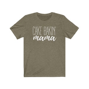 May include: A green t-shirt with the text "CAKE BAKIN' mama" in white.