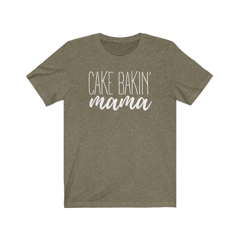 May include: A green t-shirt with the text "CAKE BAKIN' mama" in white.
