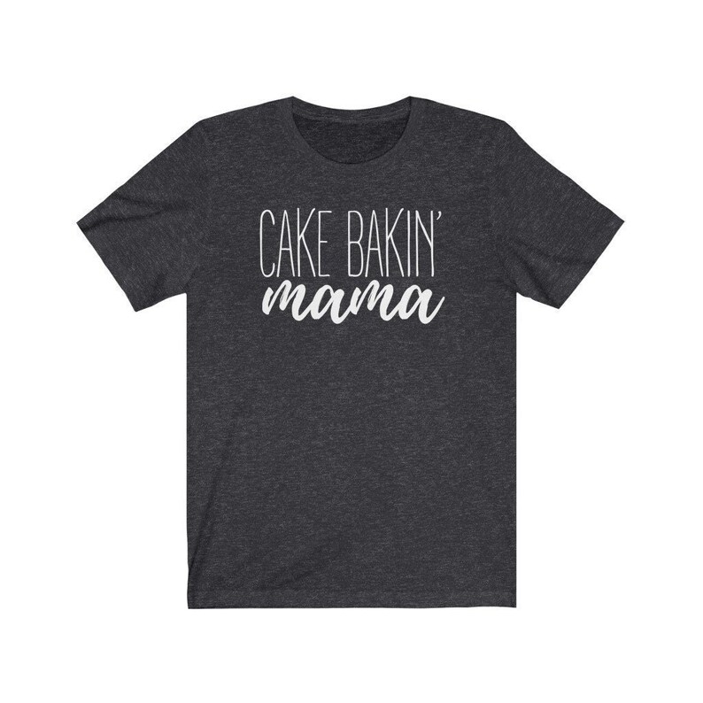 May include: Dark heather grey t-shirt with the text "Cake Bakin' mama" in white.