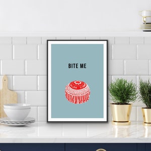 May include: A blue and white poster with the text "Bite Me" and a red and white candy-like object with white text.