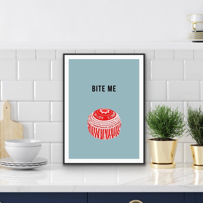 May include: A blue and white poster with the text "Bite Me" and a red and white candy-like object with white text.