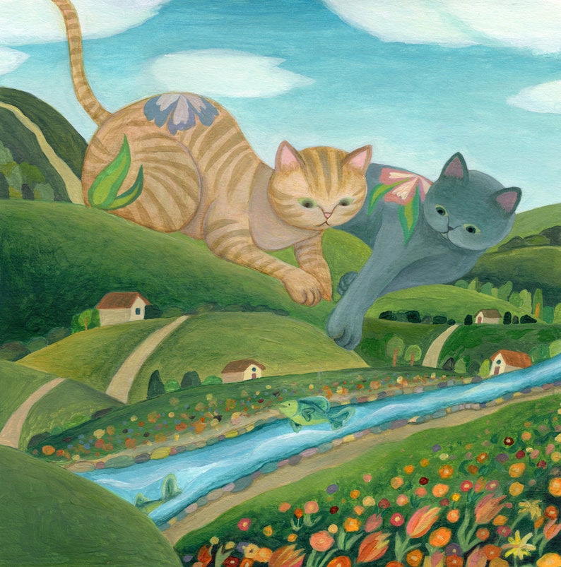 May include: A painting depicting a tan tabby cat with a blue flower on its back and a solid grey cat with a pink flower on its back leaping over a blue river. A green fish swims in the river below, surrounded by rolling green hills and colourful flowers.