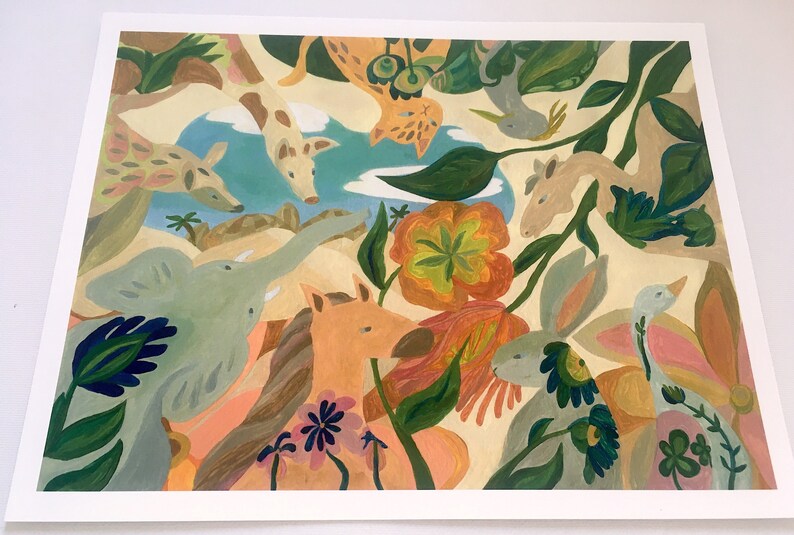 May include: A square art print featuring a painted scene of various animals including an elephant, a horse, a giraffe, and a rabbit surrounded by large orange and yellow flowers, green foliage, and a blue sky with white clouds in a flat style.