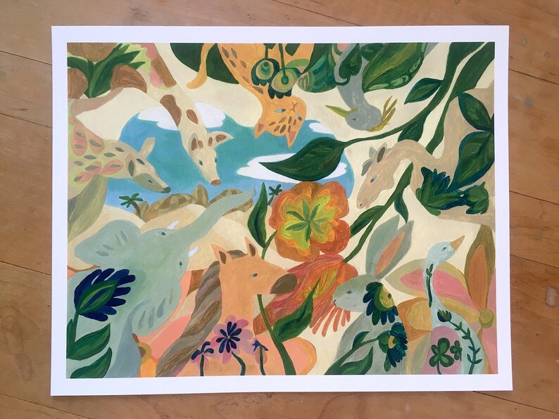 May include: A rectangular art print featuring a painted scene of various animals including a light blue elephant, a tan horse, a rabbit, and a giraffe amidst lush green foliage, large orange flowers, and a small blue pond under a pale yellow sky.