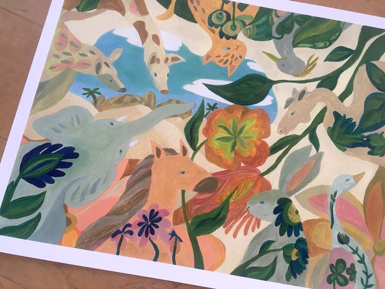May include: A colorful art print featuring a whimsical collection of animals including a giraffe, elephant, horse, rabbit, and bird amidst large orange and green flowers. The composition uses a palette of soft blues, pinks, and earthy tones.