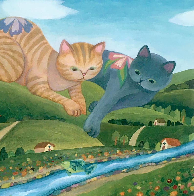 May include: A painting of two cats flying over a landscape. One cat is orange with stripes and a purple flower on its back, while the other is blue with a pink flower on its back. Below them, a green fish swims in a blue river through a valley.