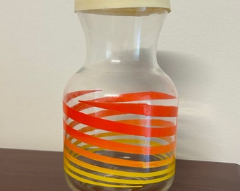 Retro Carafe Juice Jug with Lid - Vintage 70's Drink Ware - Graphic & Vibrant Red Orange Yellow Spiral Design -