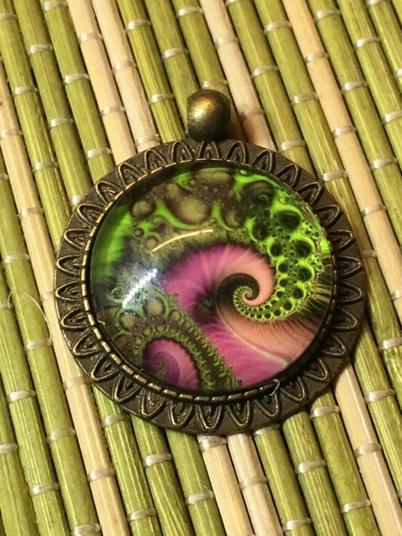 and magic-interested protective amulet mystical spiral spirituality Pendant with chain image under a glass block for esotericism
