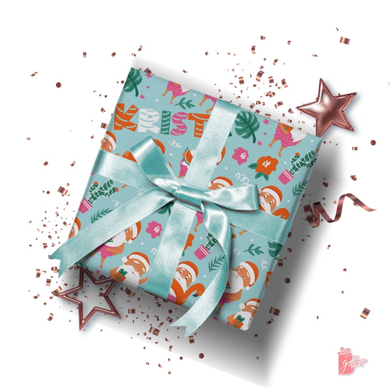 Scenes of shirtless Santa enjoying a slice of juicy watermelon, floating in a pink flamingo inflatable tube, & spreading Christmas cheer with cute gifts wrapped in red. Surrounded by tropical plant & flower illustrations on blue. Add any Custom Name