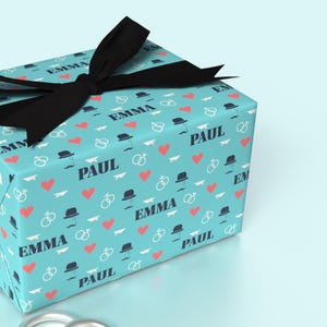 Personalized Blue Wedding Wrapping Paper with Name | Hearts, Rings and Paper Plane Design
