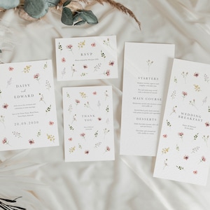 May include: Wedding invitation suite with floral designs. The invitation card says "Daisy and Edward" with the date "20.09.2030". The RSVP card says "RSVP" and the thank you card says "Thank You". The menu card says "Wedding Breakfast" and lists the starters, main course, and desserts.