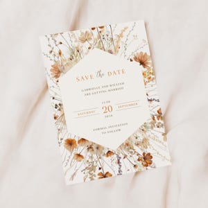 May include: Save the date card with a floral design. The card is white with a hexagonal frame. The text reads "Save the Date, Gabrielle and William are getting married, Saturday, September 20, 2030, Formal Invitation to Follow."