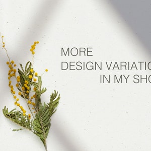 May include: A sprig of mimosa with yellow flowers and green leaves against a white background. The text "MORE DESIGN VARIATION IN MY SHOP:" is written below the sprig.