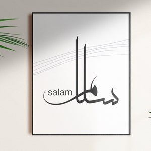 May include: A black and white printable art print with the Arabic word for "peace" in calligraphy, along with the word "salam" written in English below it. The background is white with thin gray lines.