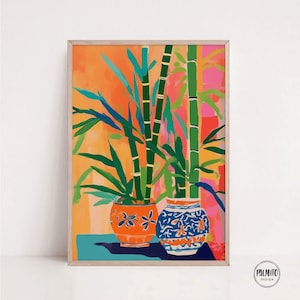 Puede incluir: Una pintura de dos plantas en macetas con hojas verdes y tallos de bambú sobre un fondo naranja y rosa brillante. Las macetas están decoradas con motivos florales azules y blancos.