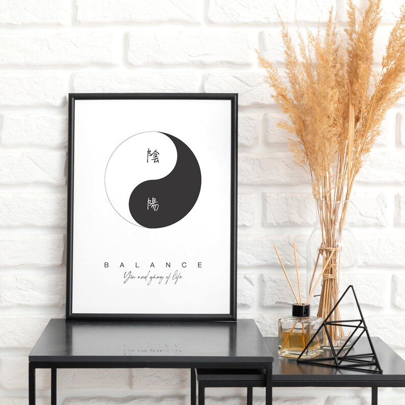 May include: Black and white Yin Yang symbol with Chinese characters for Yin and Yang. The text below reads "BALANCE Yin and yang of life" in a black frame.