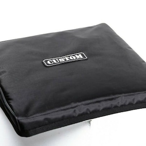 May include: Black padded case with a white "CUSTOM" label.